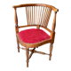 Corner armchair, dark wood and red velvet office chair.