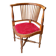 Corner armchair, dark wood and red velvet office chair.