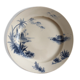 Flat in iron earth "views of the Orient" faience of Gien