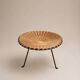 Small vintage tripod stool in woven rattan and black metal, dating from the 1970s.