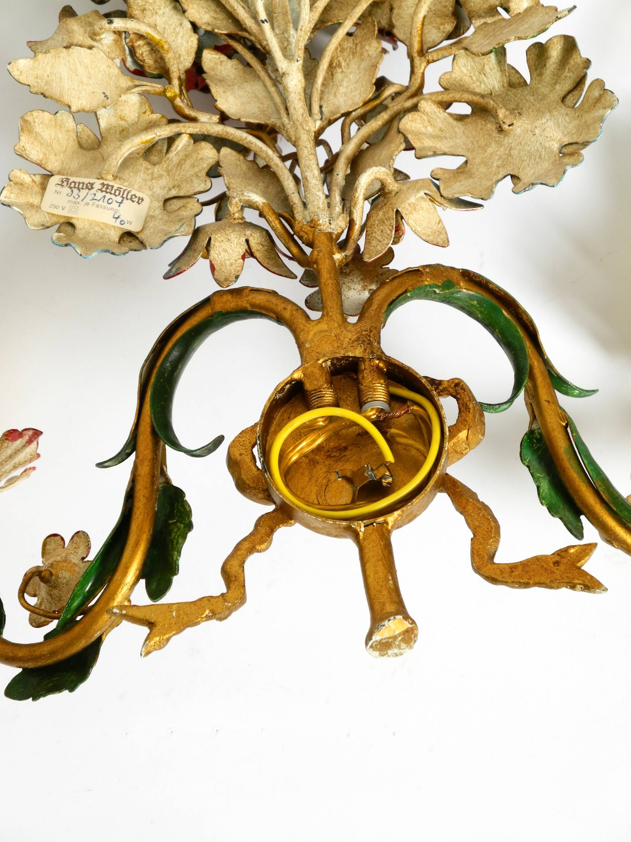 A pair of beautiful 1960s hand-painted and gilded metal wall lamps by Hans