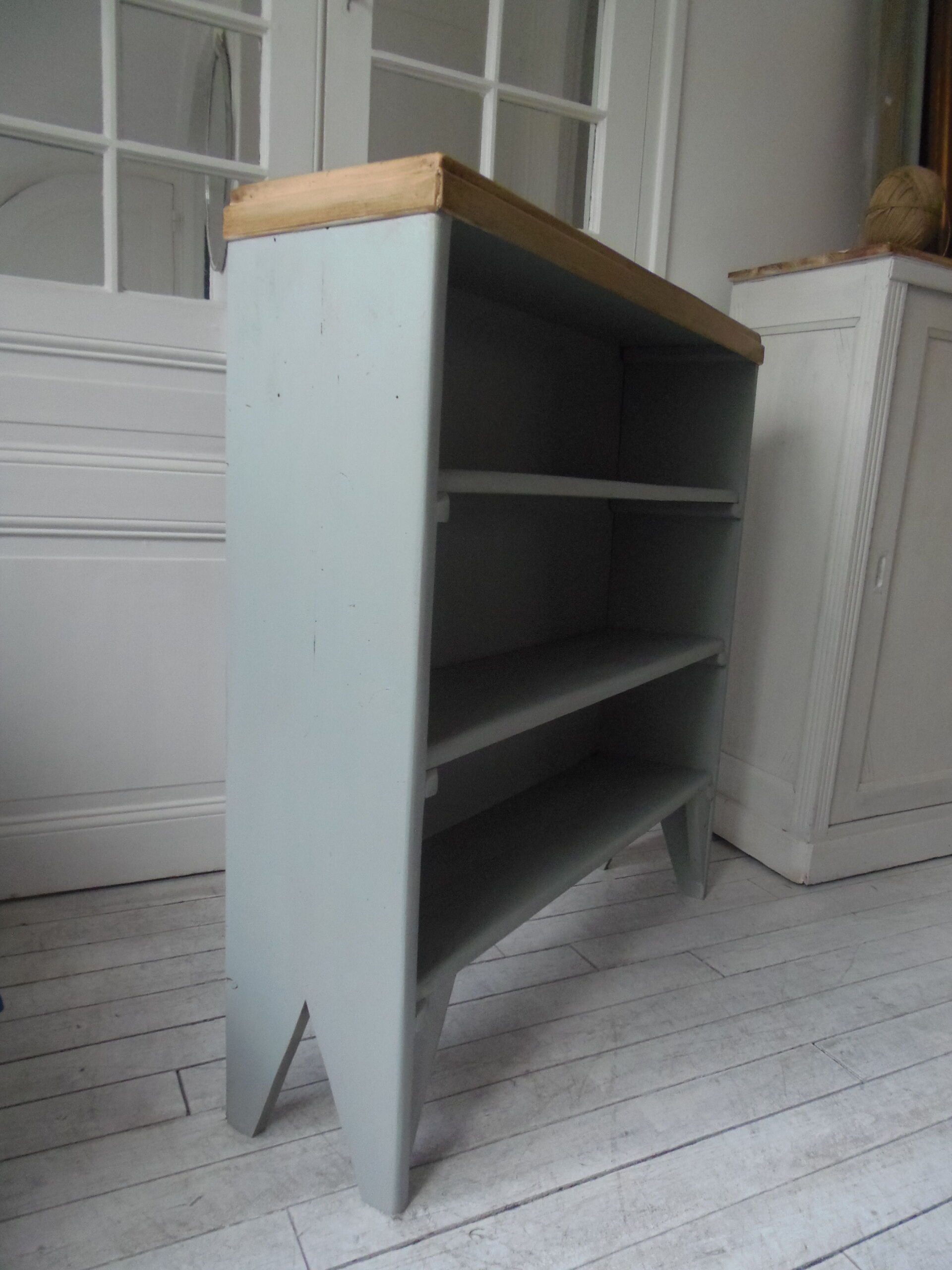 Vintage bookcase green of gray wooden top