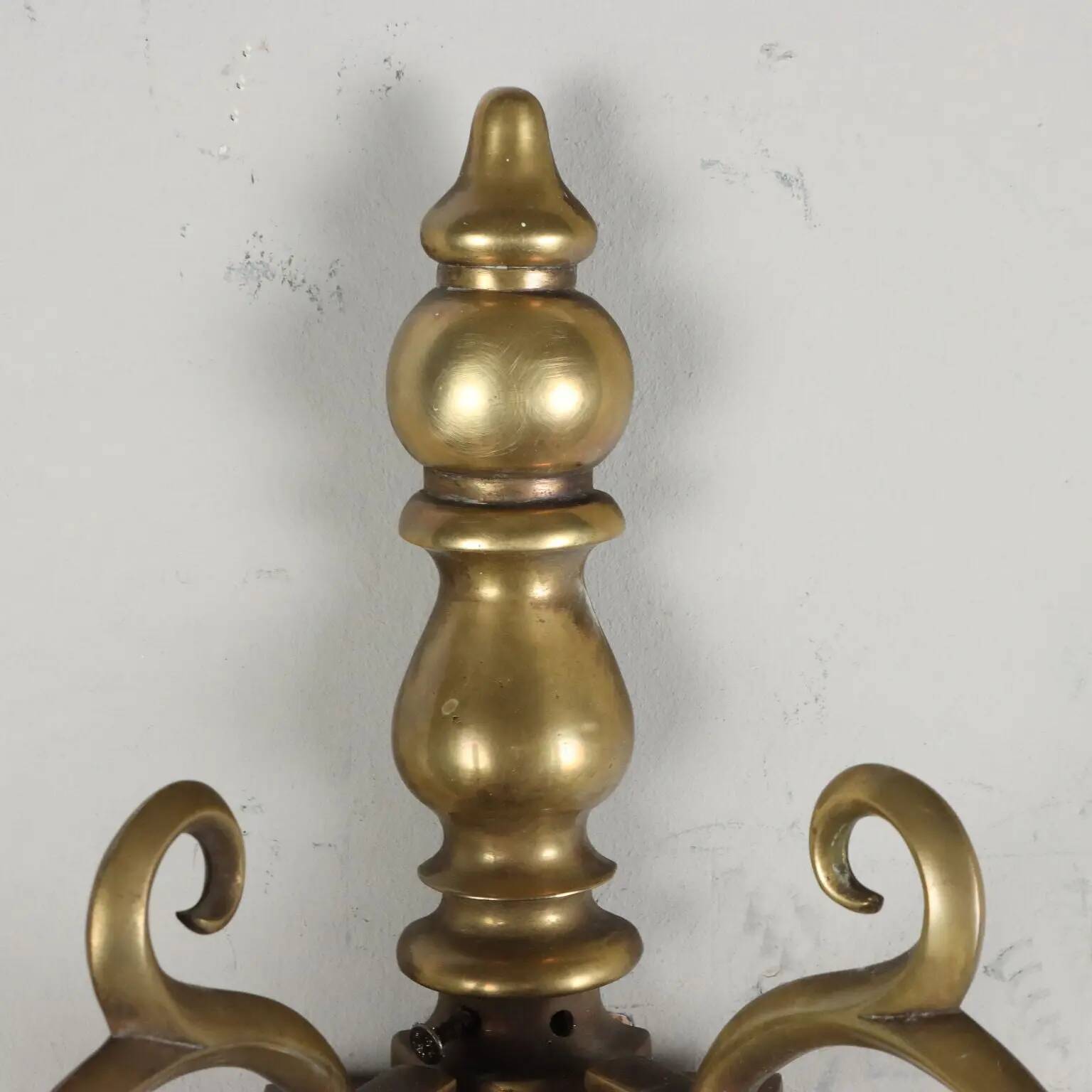 Pair of antique wall sconces in 20th-century Baroque style.