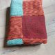 Plaid en patchwork tricoté main