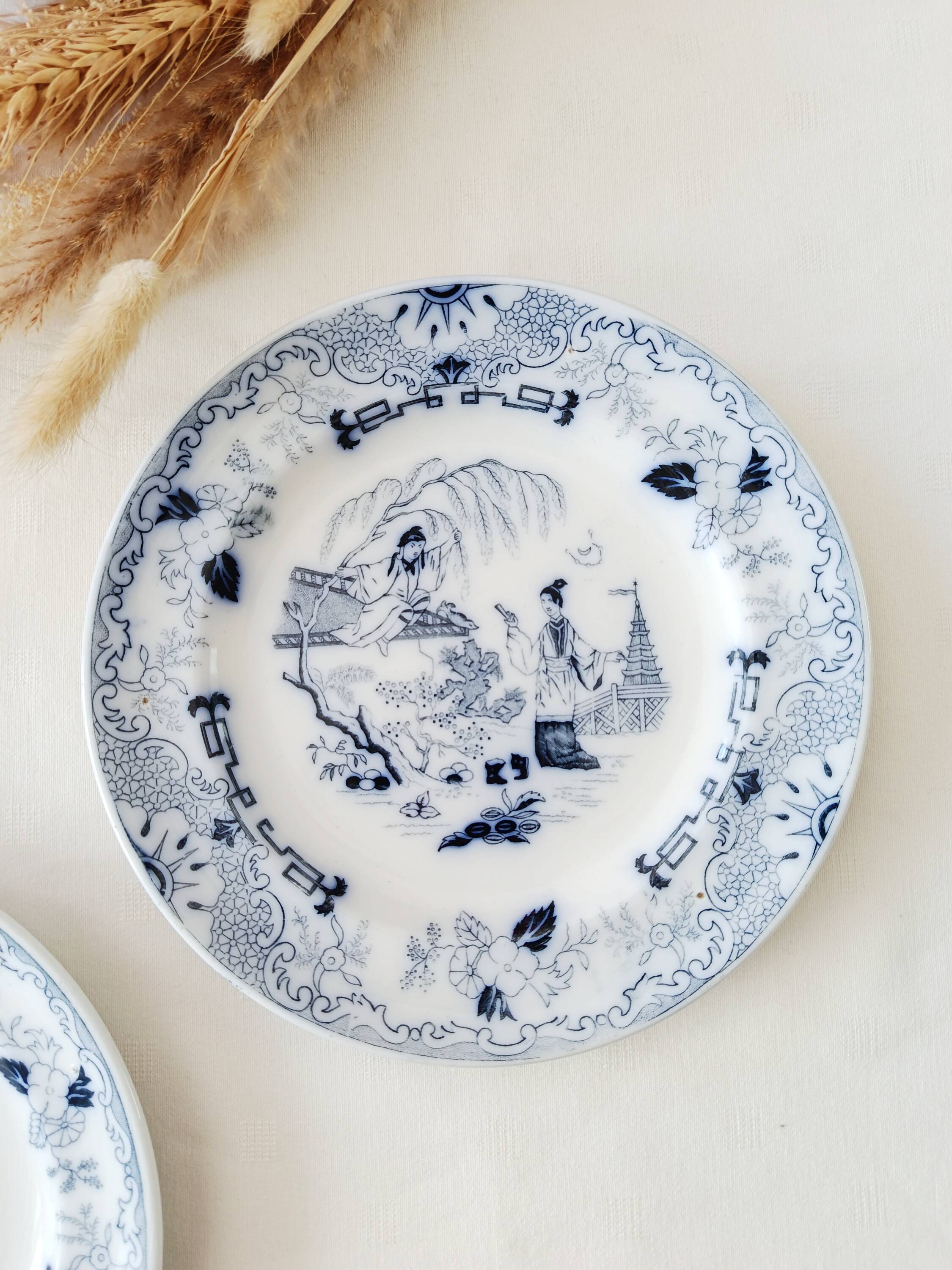 Set of 2 flat plates Petrus Regout, Timor