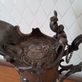 Old glass and tin ewer