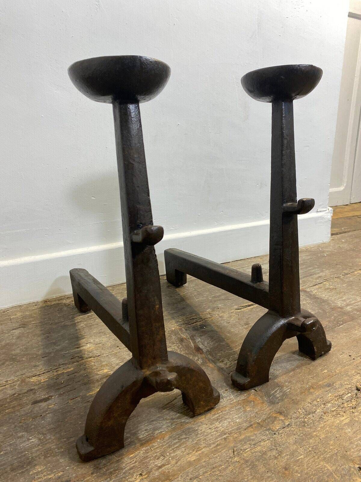 Pair of antique cast iron fire dogs, rustic decor, around 1900.