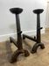 Pair of antique cast iron fire dogs, rustic decor, around 1900.