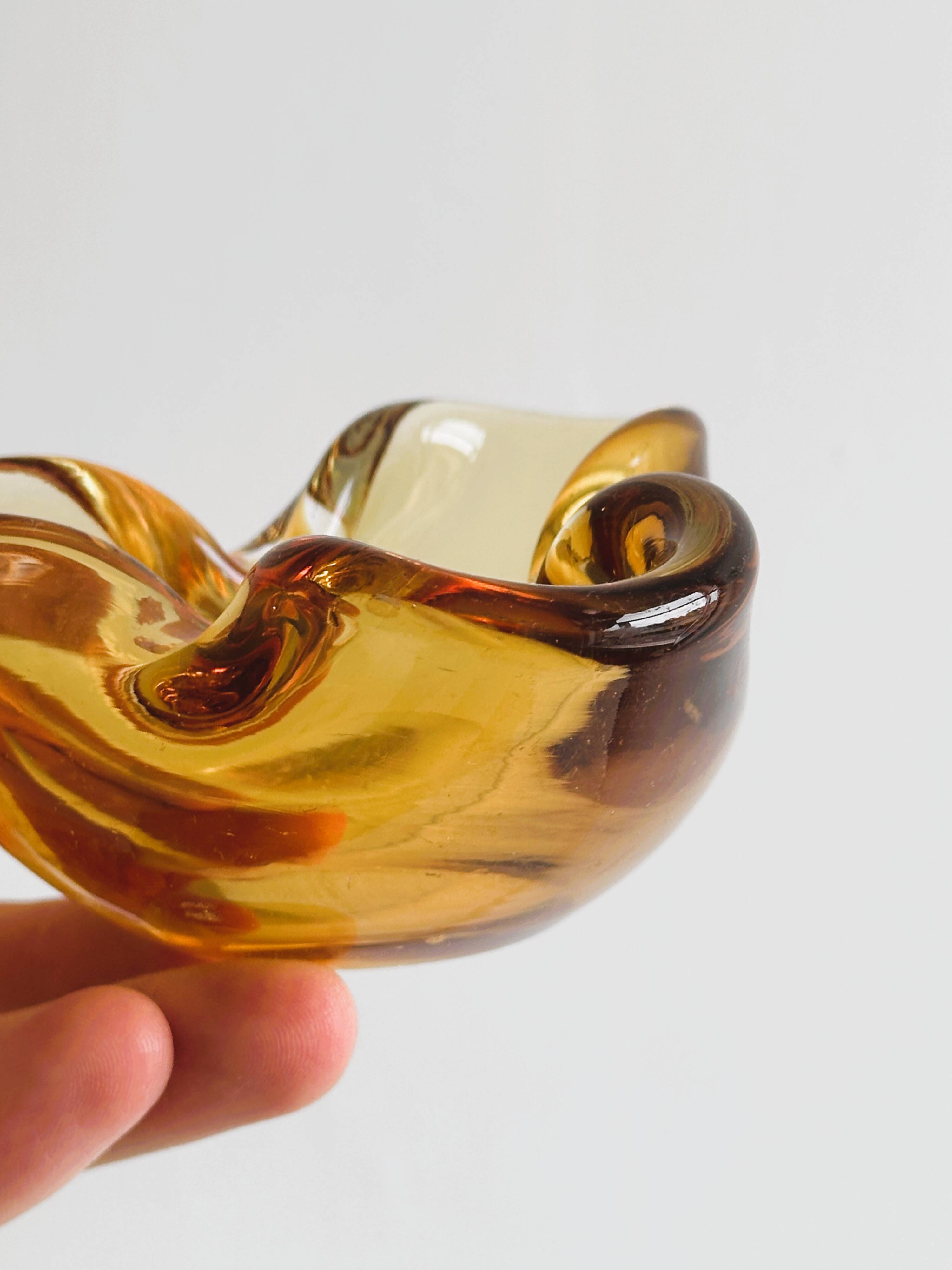 Thick amber yellow glass ashtray