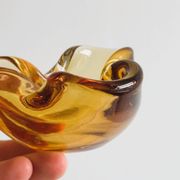 Thick amber yellow glass ashtray