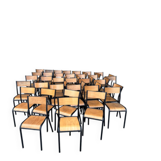 Set of 50 wooden and metal school chairs.