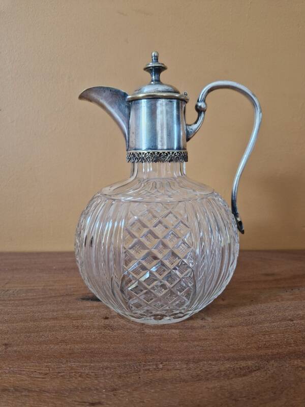 Cut crystal carafe and silver-plated metal