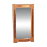 Vintage Danish wall mirror design from the 1960s in oak and stamped brass.