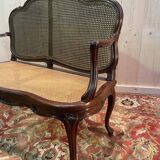 Louis XV mahogany and cane bench