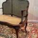 Louis XV mahogany and cane bench