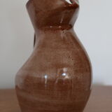 Brown painted earthenware pitcher