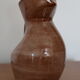 Brown painted earthenware pitcher