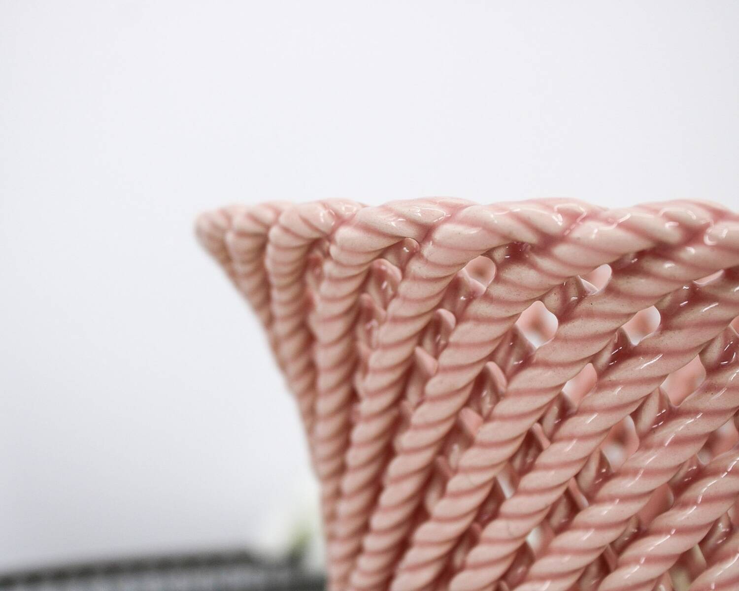 Small vintage handmade plant pot in pink woven ceramic