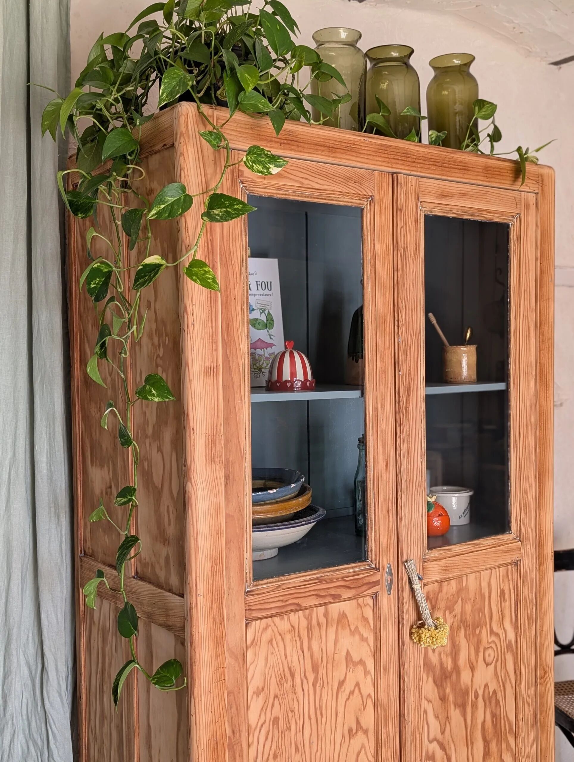 Old glass-fronted wooden library – blue interior