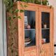 Old glass-fronted wooden library – blue interior