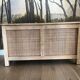 Oak storage chest with rattan caning