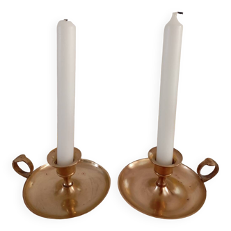 2 cellar-level candlesticks