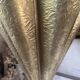 Antique repoussé brass umbrella stand