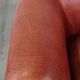 English Chesterfield club chair in light red cowhide leather