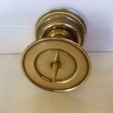 Old brass candle pique