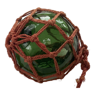 Globe, green glass float and vintage rope