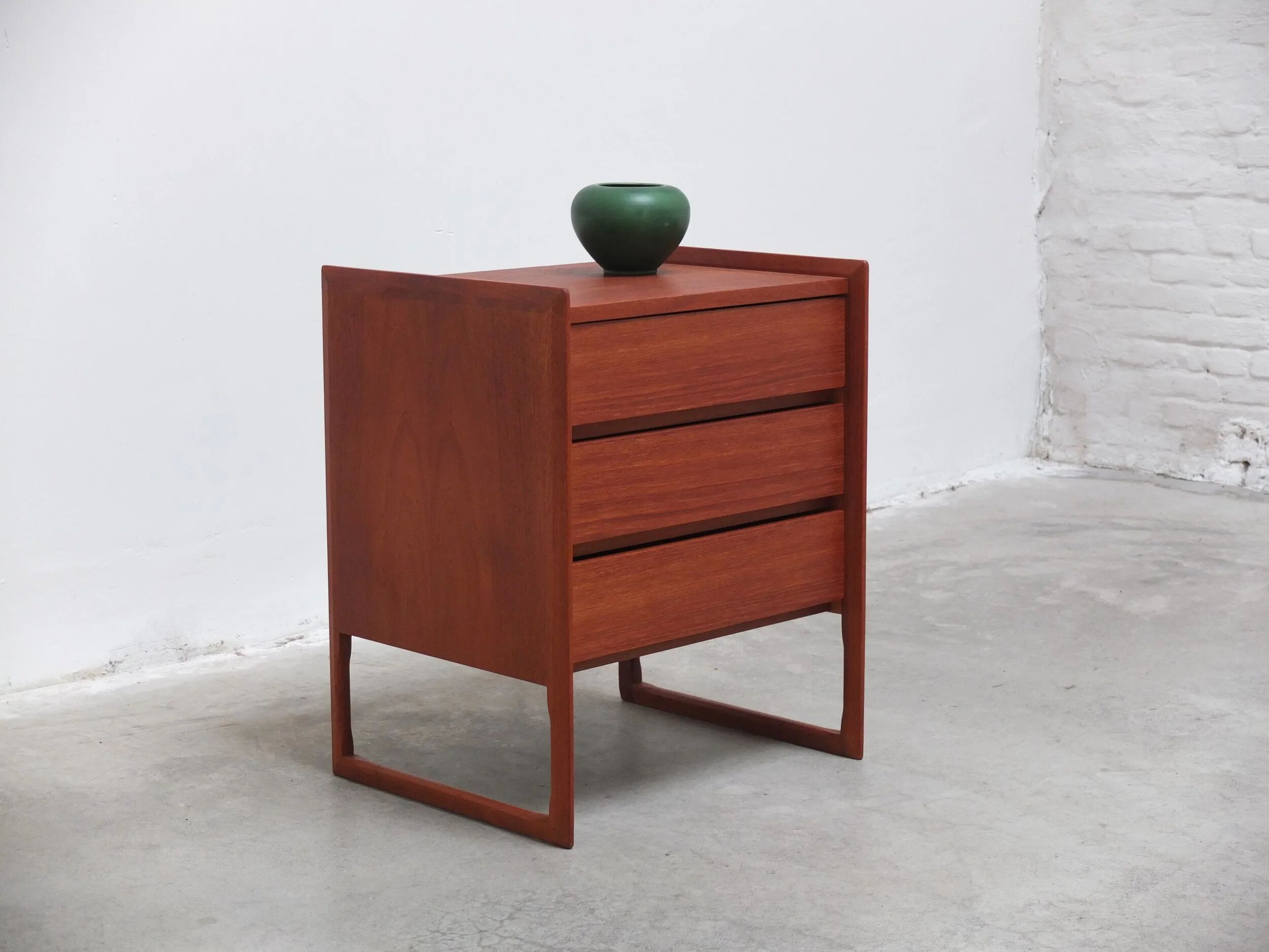 Danish chest of drawers in teak with sledge feet, 1960s