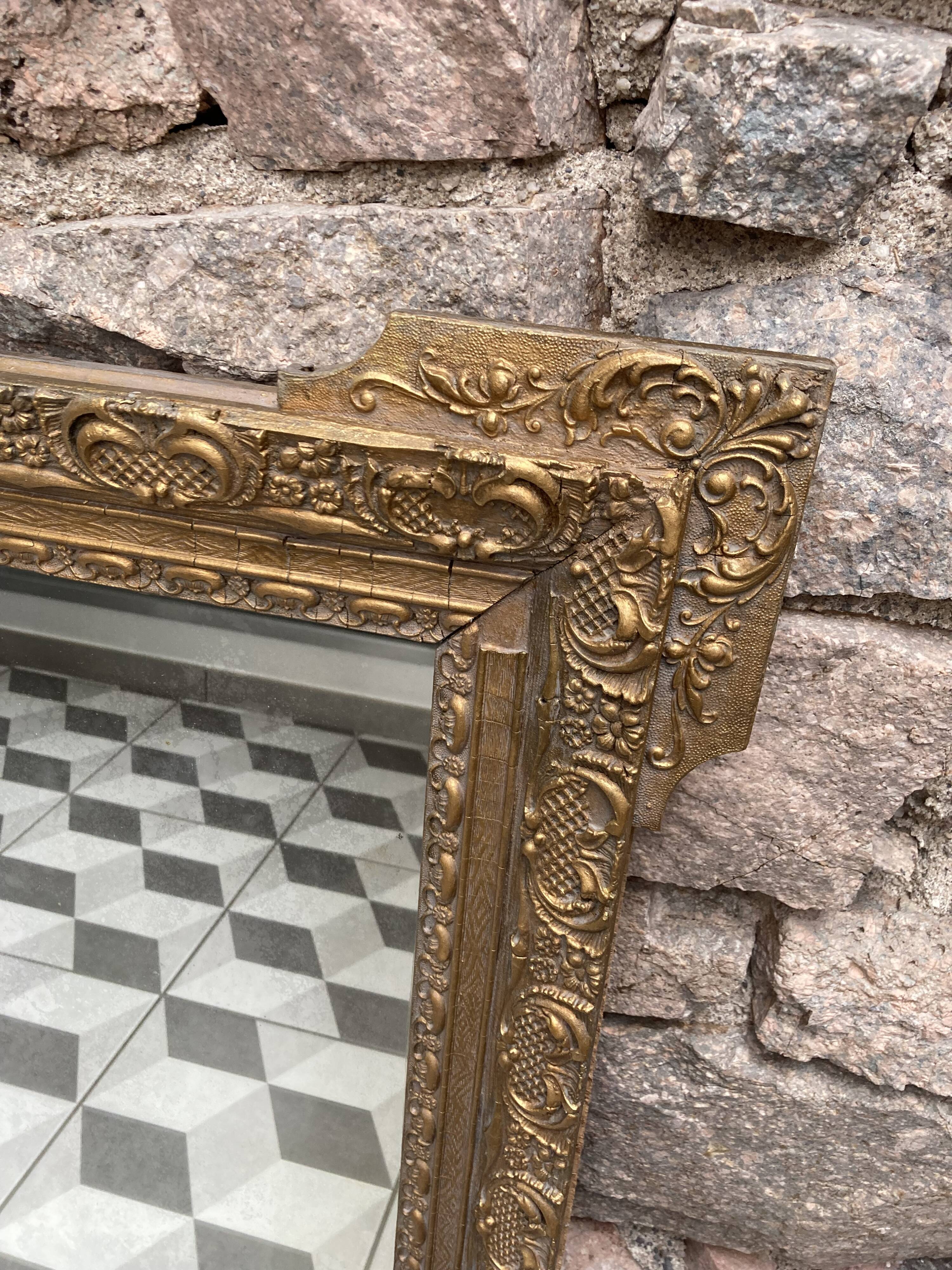 Gilded mirror in wood and stucco, 19th century, 60x88cm