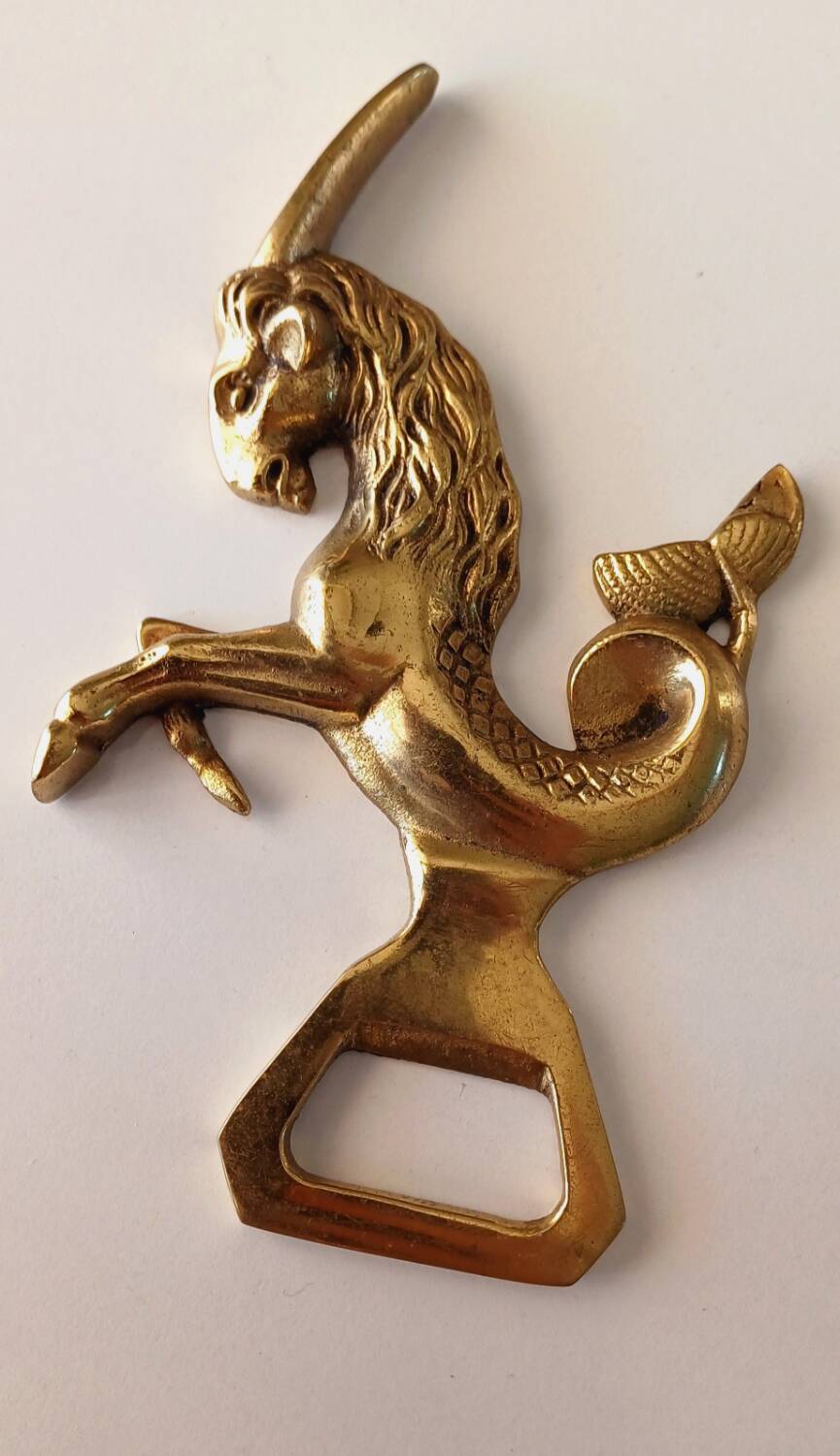 Animal bottle opener in gilded bronze