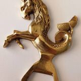 Animal bottle opener in gilded bronze