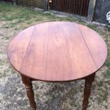 Louis Philippe oval shuttered table in solid cherry wood with 2 drawers.