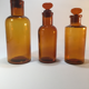 Lot of three pharmacy flasks