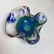 Murano glass pocket emptier