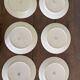 Vintage Longchamp France service – 18 graphic plates from the 1950s.