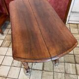 Folding round wooden table