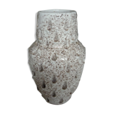 Spotted white ceramic vase with hollow form of tears