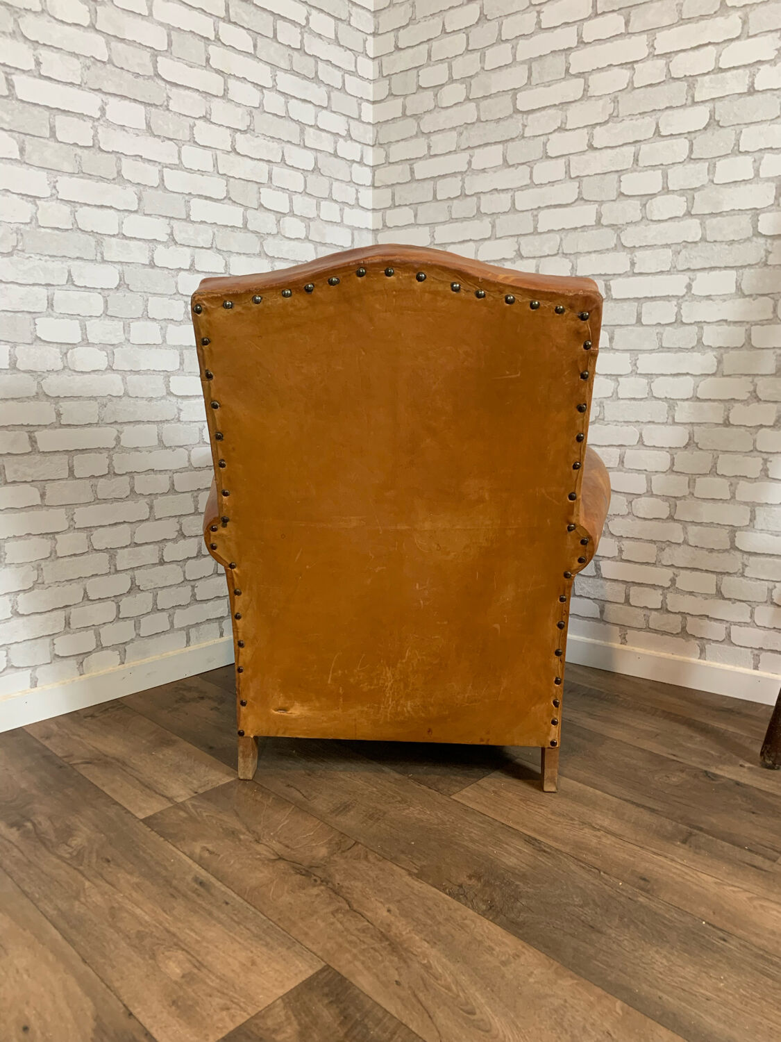 Club armchair in leather 1930