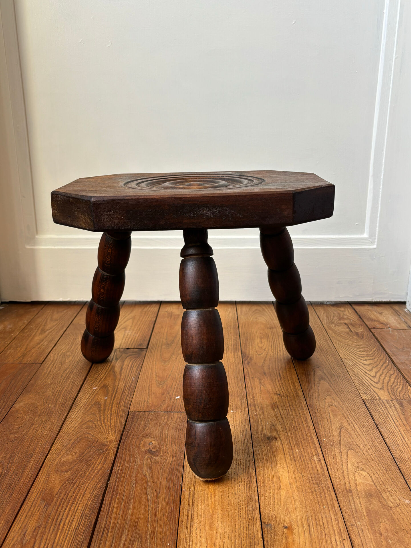 Wooden tripod stool
