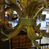 Gilded brass chandelier and silver lily of the valley bells