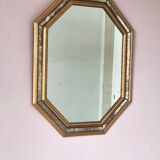 Antique mirror with gilded wooden frame.
