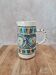 Old pitcher in Tunisian earthenware with colourful decoration.