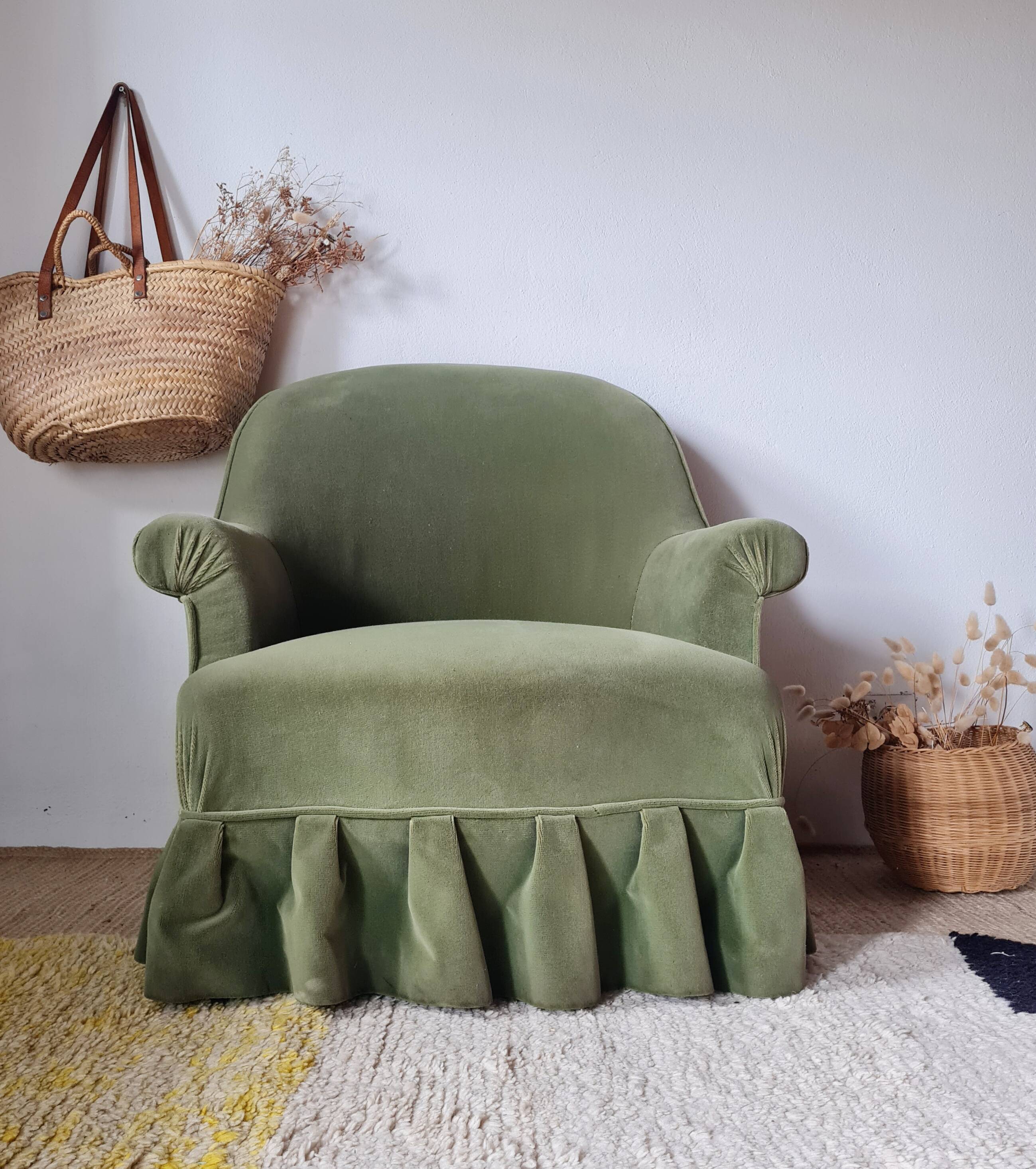 Green velvet armchair