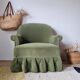 Green velvet armchair