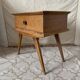 Scandinavian style bedside table with tapered legs from the 1960s.