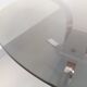 Vintage round coffee table in glass, chromed metal and black metal Space Age style of the 70s