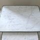 Nesting tables in dark wood and white marble